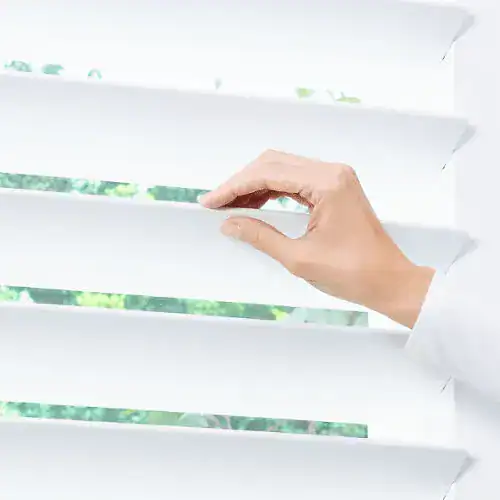 Light-filtering white blinds for privacy and sun control from Advance Blinds & Drapery. Expert installation and custom options available for your home or office.