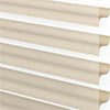 Soft beige fabric blinds with horizontal slats, stylish and functional window treatment for modern homes.