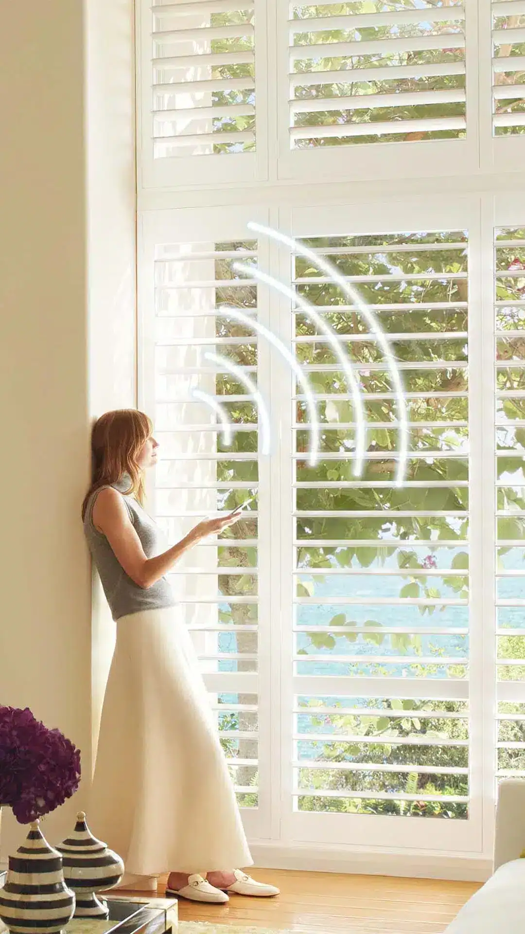 Luxurious white plantation shutters home window coverings for privacy and light control. Custom window treatments by Advance Blinds & Drapery.