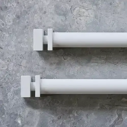 Elegant white curtain rods with modern design, ideal for enhancing window treatments in homes and offices. Perfect for decorative drapery and custom curtain installation.