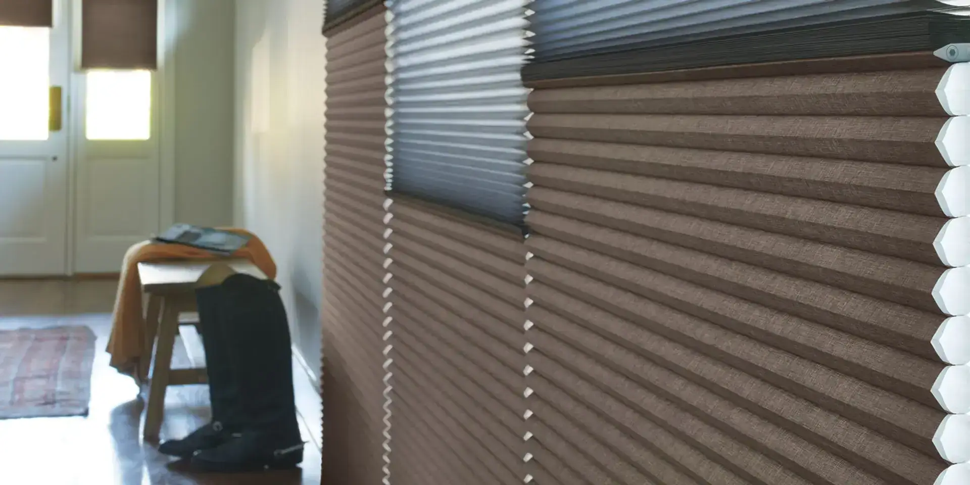 Dual-layer Duolite® honeycomb shades with upgraded features for enhanced light control and privacy.